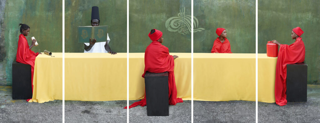 A world in common - Maïmouna Guerresi, M-eating – students and teacher, 2012. 5 photographs, colour, lambda print, on paper mounted on aluminium; 1500 × 3880 mm. Courtesy of the artist and Mariane Ibrahim